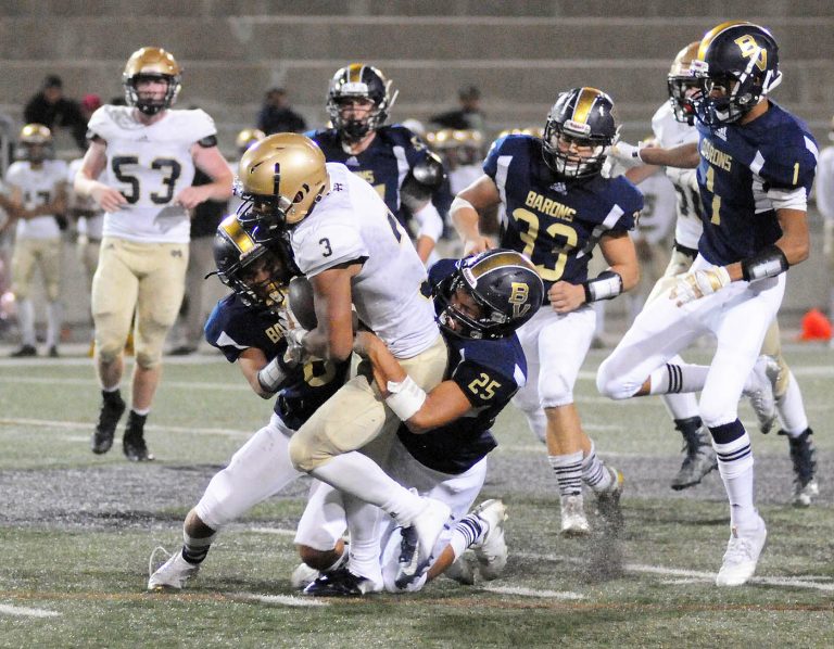 Crusaders overpower Barons in Metro-Mesa opener