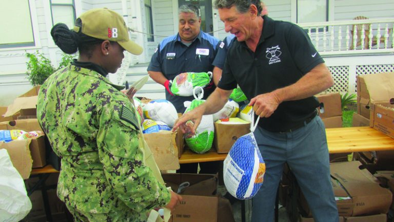 National City residents line up for turkey dinners