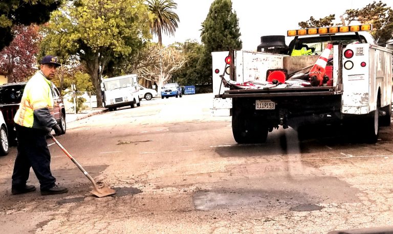 See a pothole, click or call