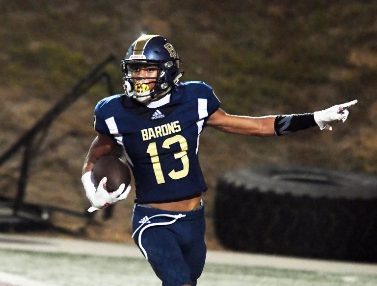 Barons race past Red Devils, 35-14, to pick up second consecutive win