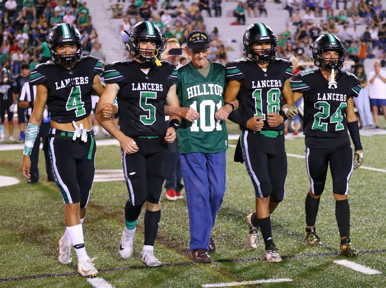 Go Green: Lancers honor WWII vet, former teacher with 43-3 victory to kick start record to perfect 3-0