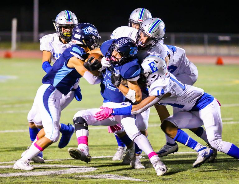 Titans end season on a rush, corral Mustangs for league title