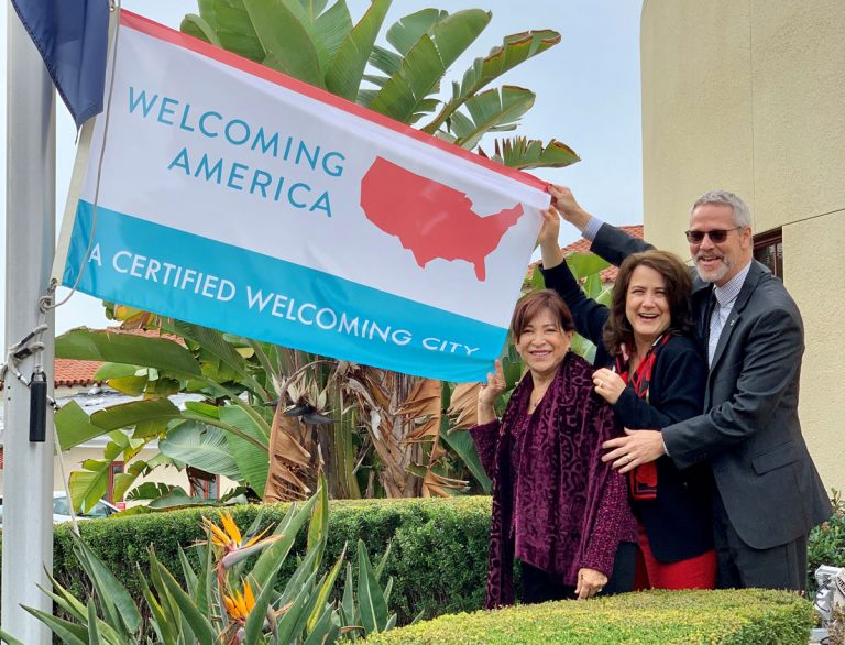 Putting out the Welcoming flag