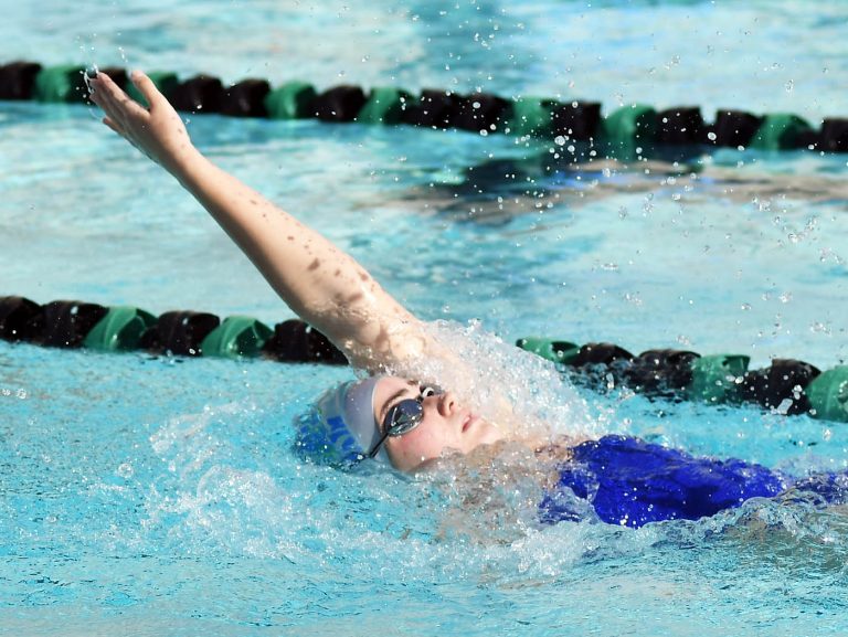 Titans top Lancers as swim season heads to possible early end