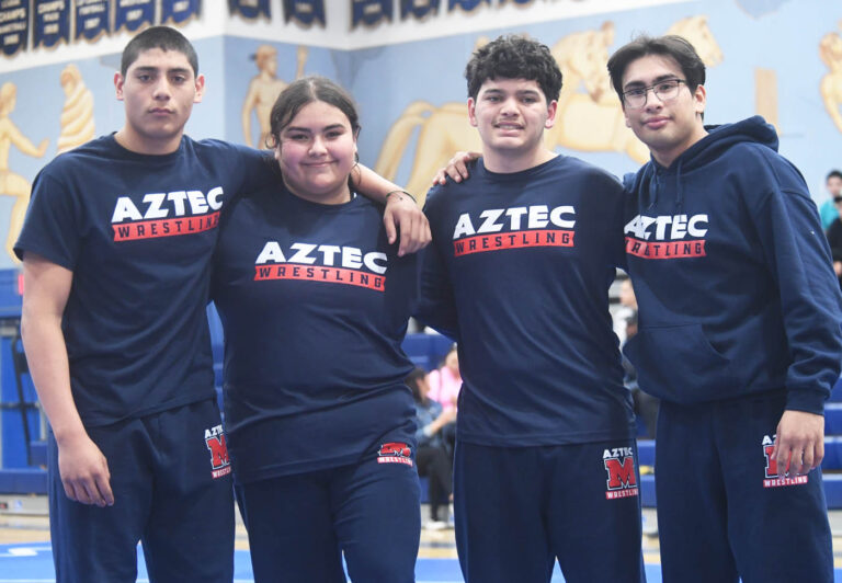 No boys wrestling team titles but four Metro man are individual champions