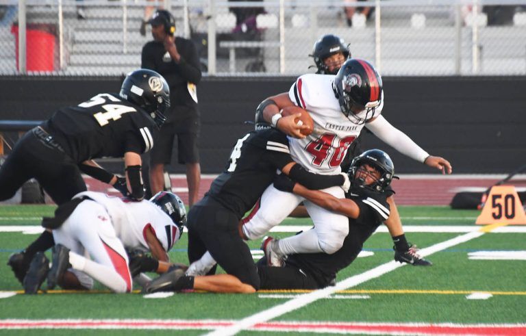 Trojans have right stuff in opener, 32-0