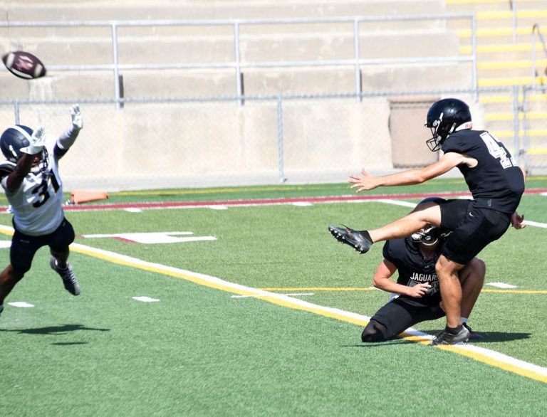 Jaguars slip past Olympians, 44-42, in triple overtime for epic win